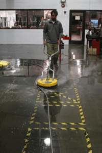 Man Washing Industrial Floor